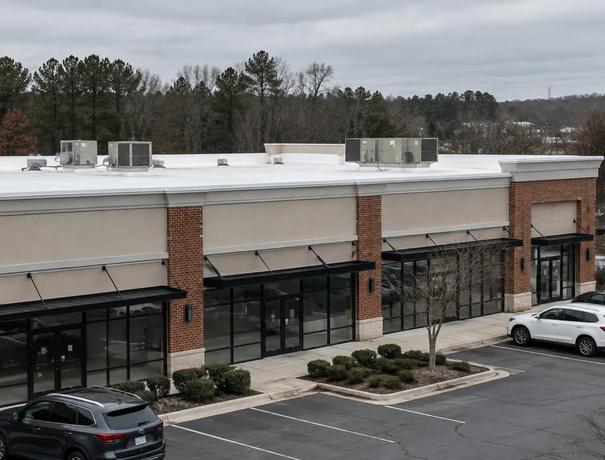 White TPO commercial flat roof on a retail building in Woodstock, GA