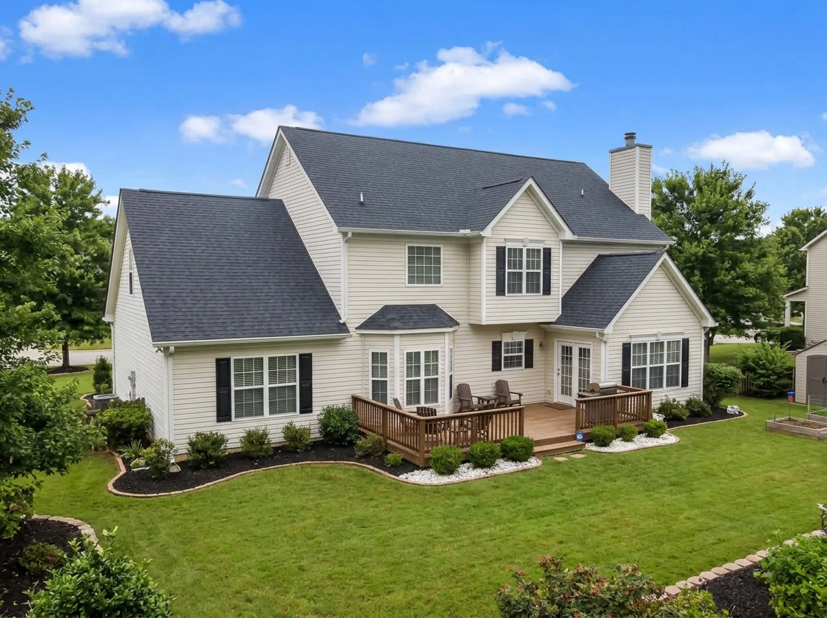 Close up of new gray architectural shingles and ridge on a Holly Springs GA home