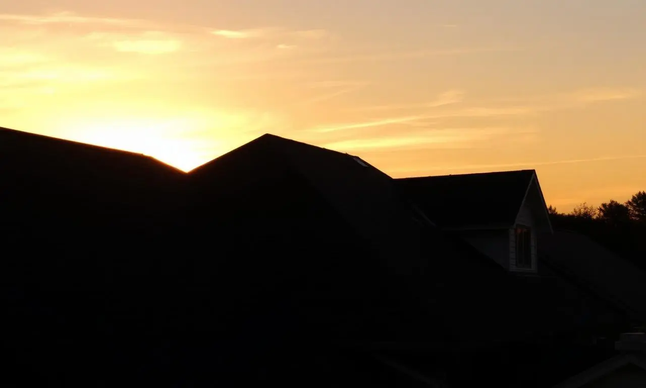 Restored Georgia roofline at sunset after emergency repair work